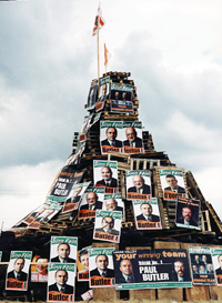 A loyalist bonfire at Stoneyfort bedecked with Sinn Féin election posters